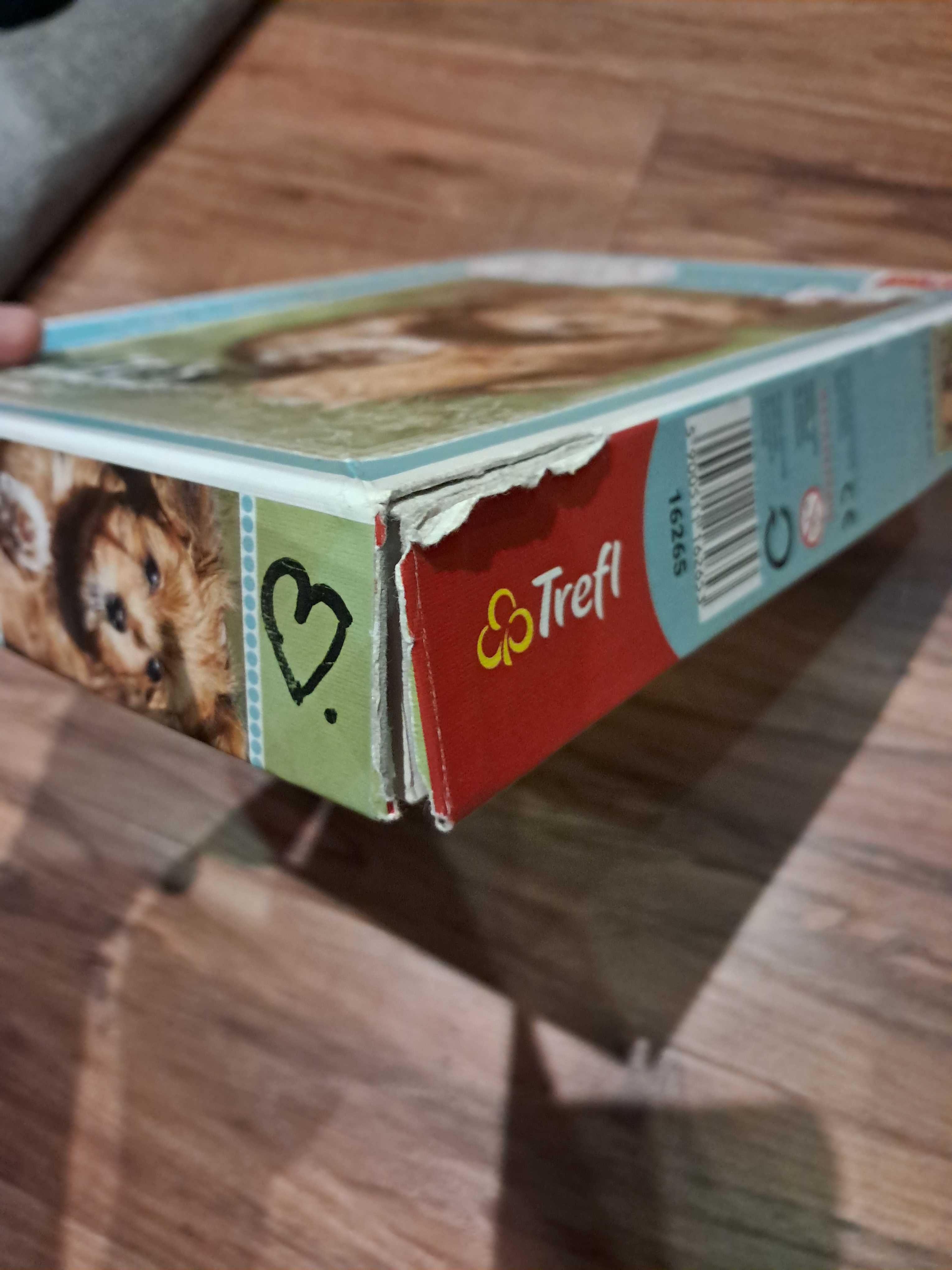 puzzle 100 elementów, stan puzzli bdb, pudełko jest uszkodzone