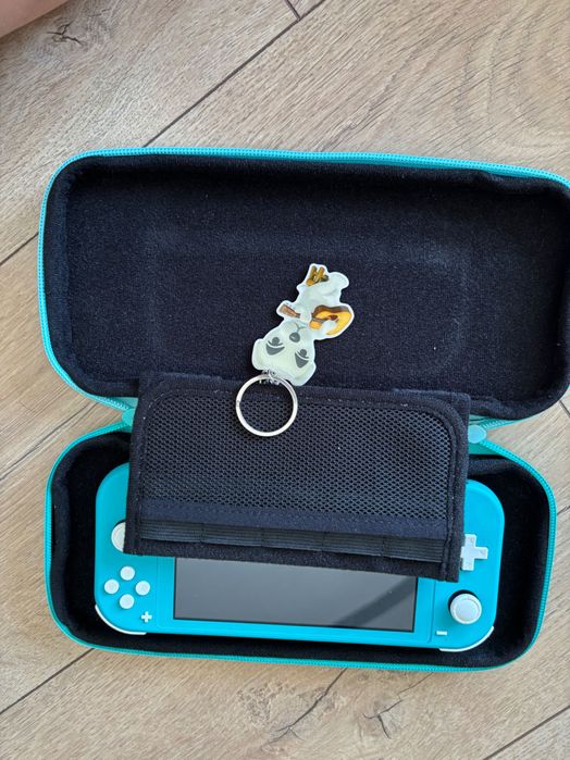 Nintendo switch lite + dwie gry + oryginalna ładowarka