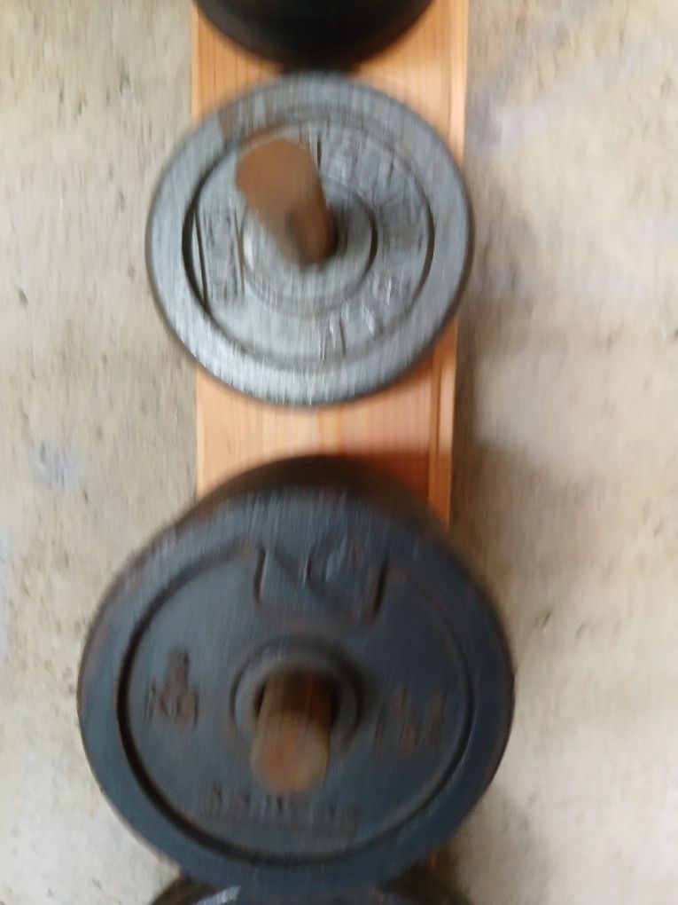 Pesos de 28mm para musculação