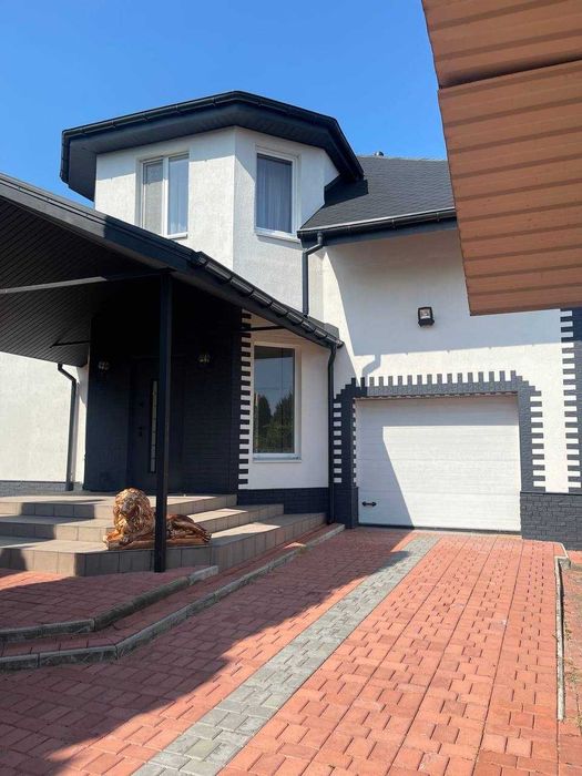 Сучасний будинок з купою переваг для щасливого життя вашої родини