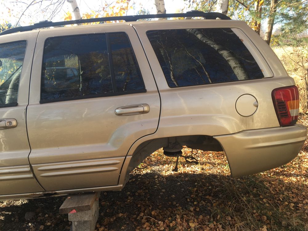 Jeep Grand Cherokee Klamka dyfer klapa zamek szyba relingi zacisk