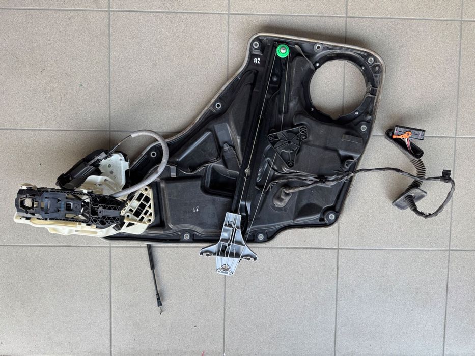 задній лівий склопідйомник VW Tiguan 08-16