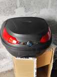 Top case nova. Com base.