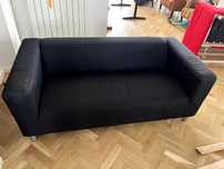 Dwie sofy Ikea Klippan - czarna i czerwona