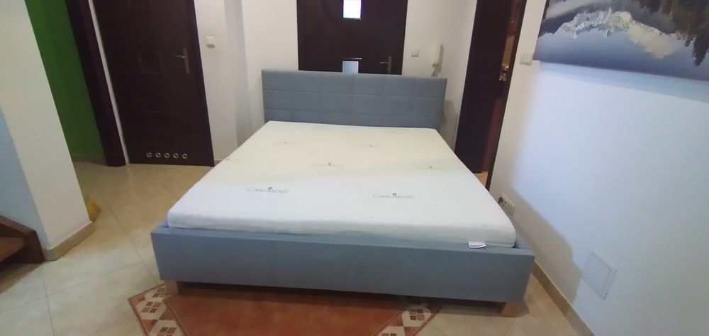 Łóżko tapicerowane z materacem nowe stelaże 180/200