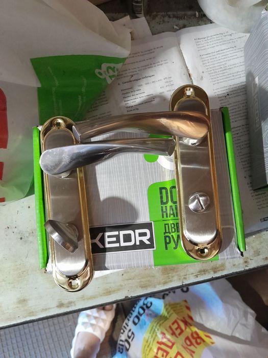 Ручка двірна нові, золото/срібло