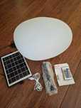 Lampa solarna w kształcie kamienia