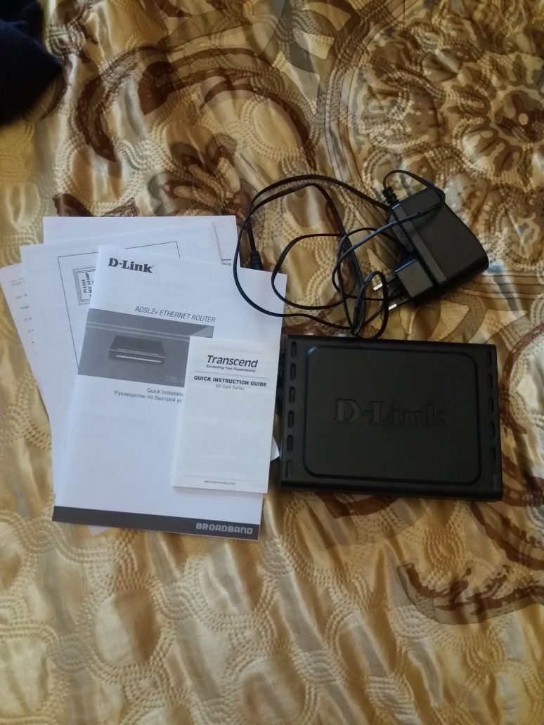 Модем DSL-2500U в коробке