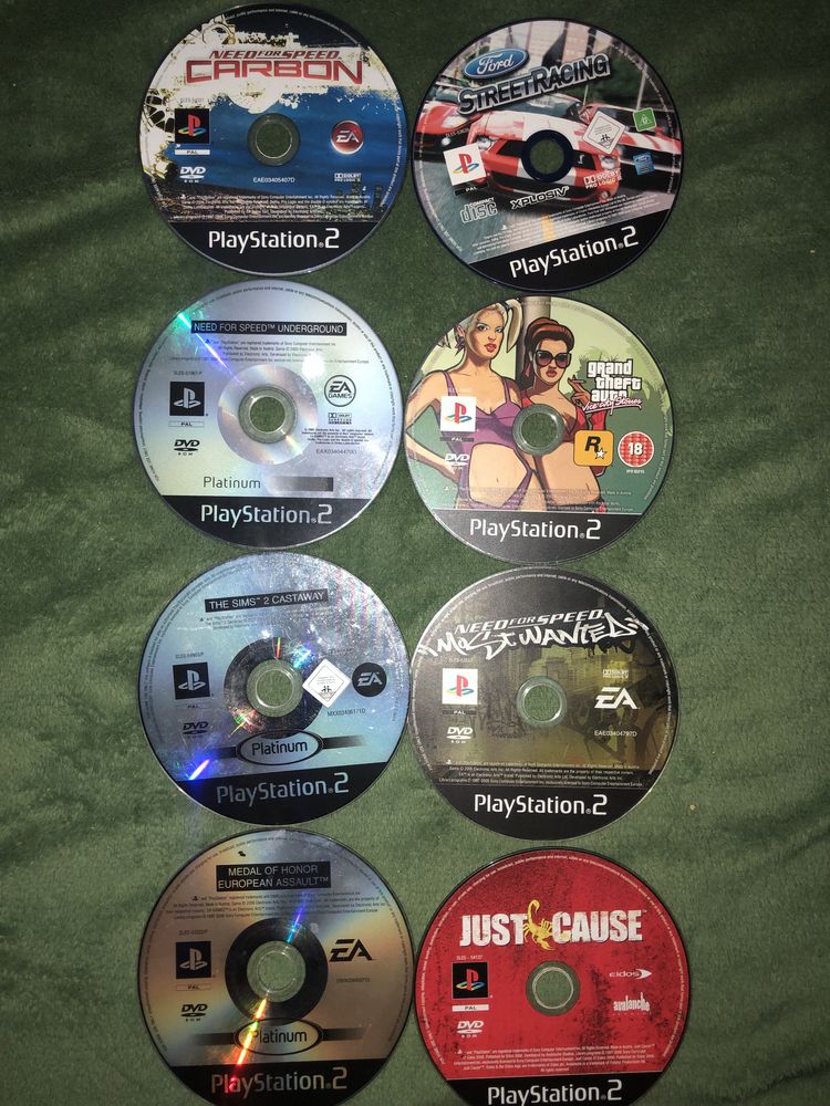 Vendo Playsattion 2 c/2 comandos +8 jogos + cartão de memoria 8mb