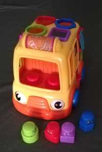 Brinquedo Bebé carro com peças de formas.