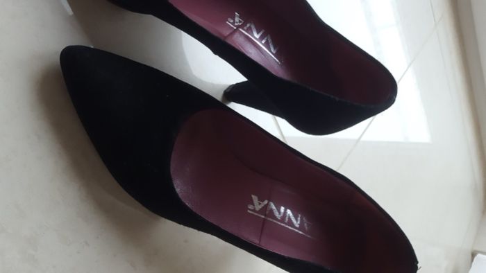 Sapatos de salto alto em bico