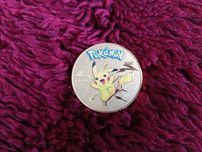 Pikachu. Pokemon. Moneta.