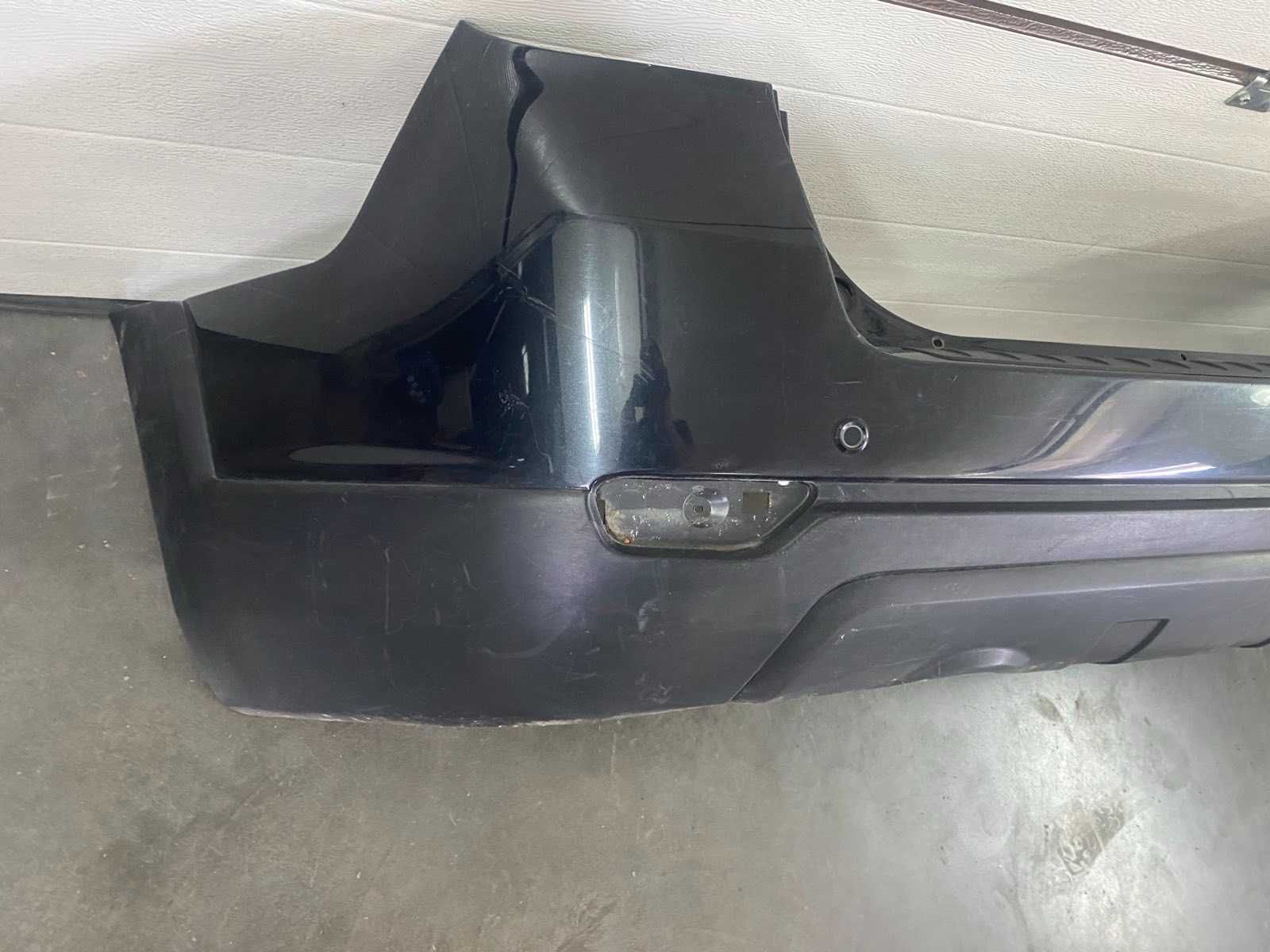 Бампер задній Chevrolet Captiva C140 12-16р. 20961269