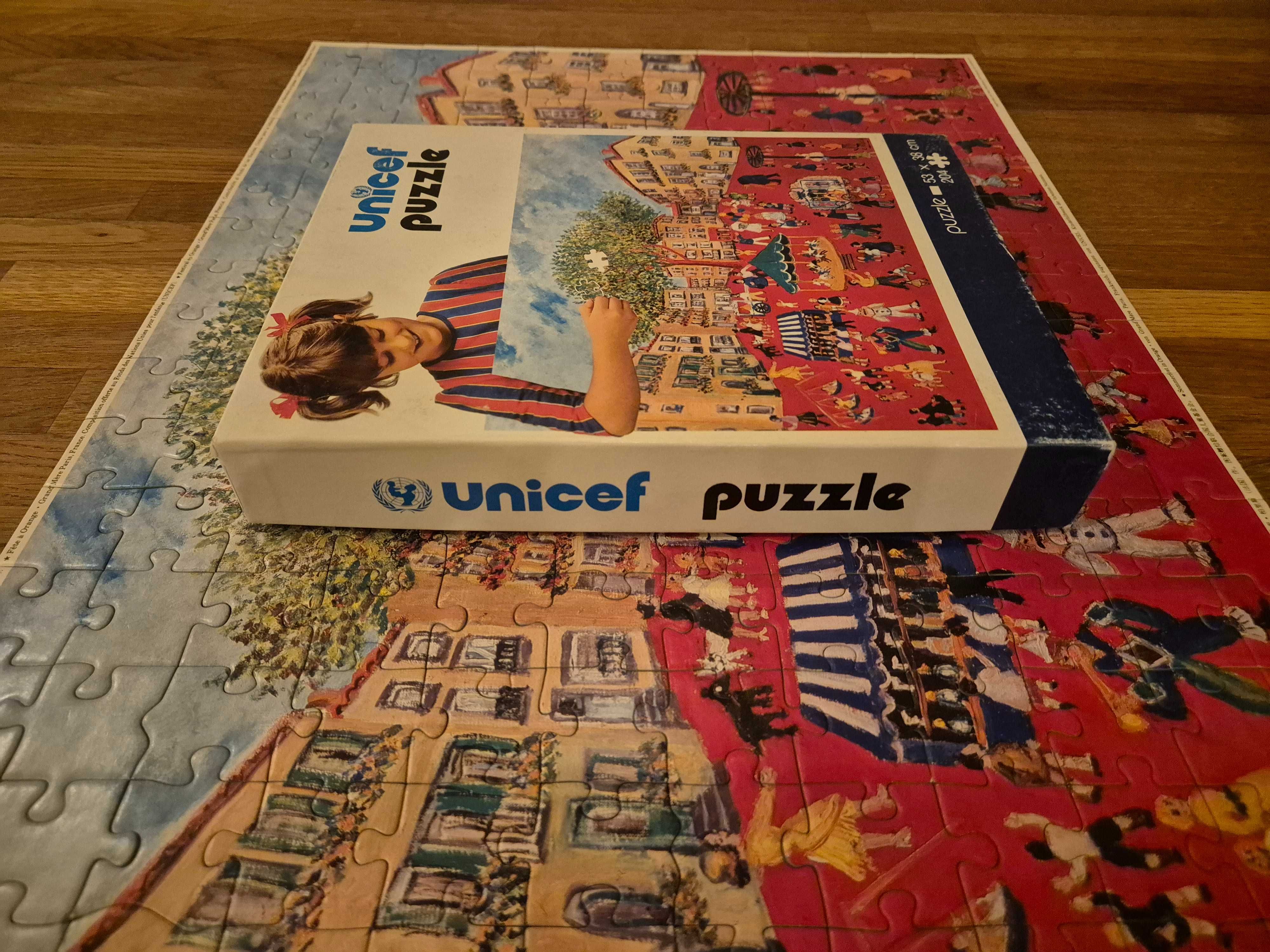 Puzzle Unicef 700F, super stan, 94