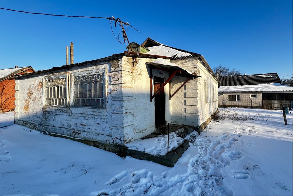 Будинок з земельною ділянкою