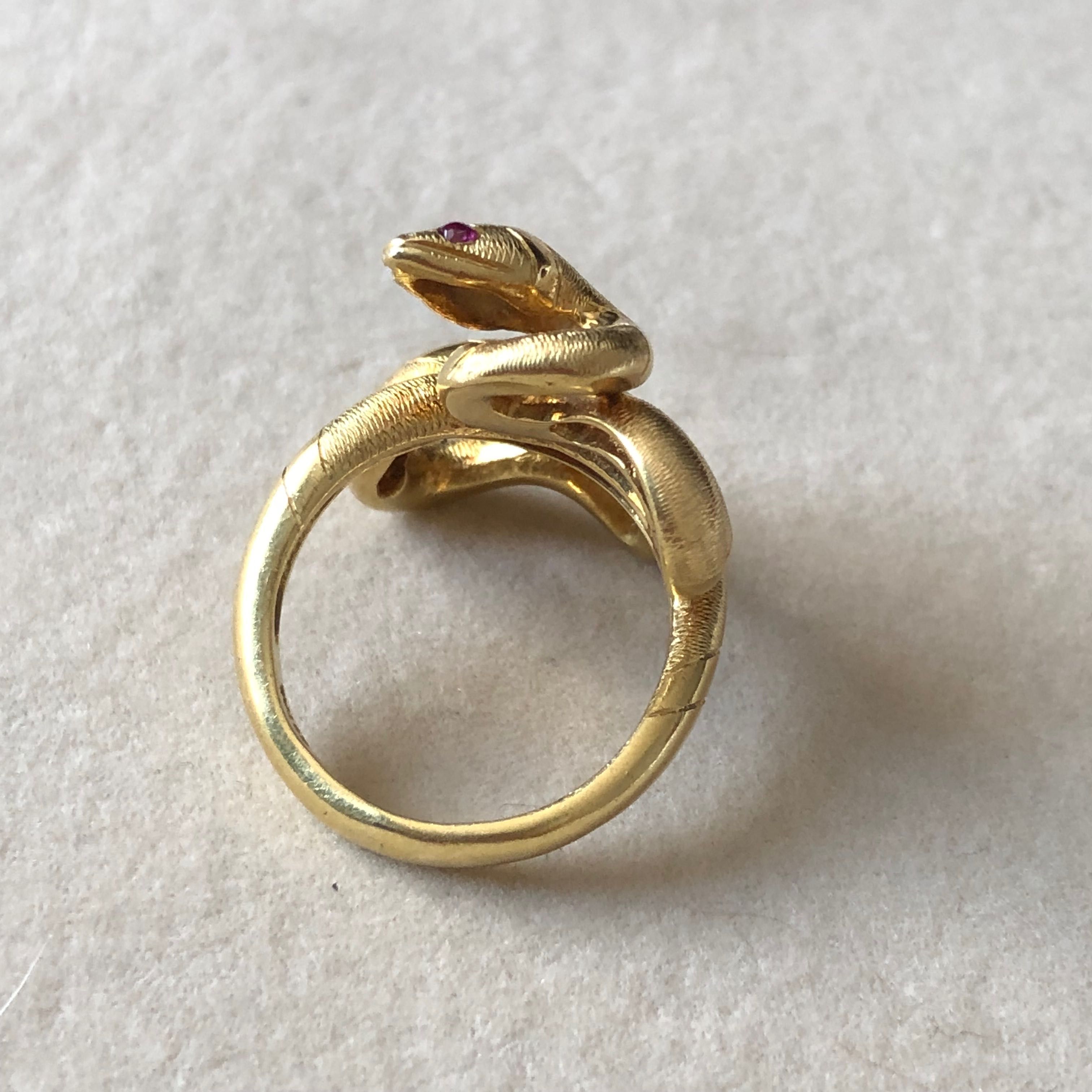 Włoski pierścionek wąż z 18k złota.