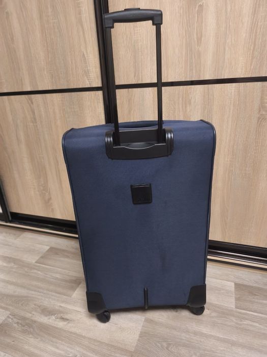 Чемодан бошьшого размера на колесах, валіза для подорожей тканина