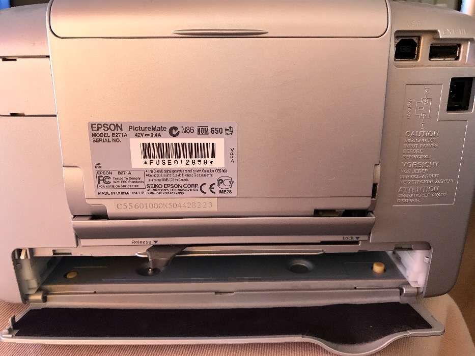 Impressora de fotos portátil