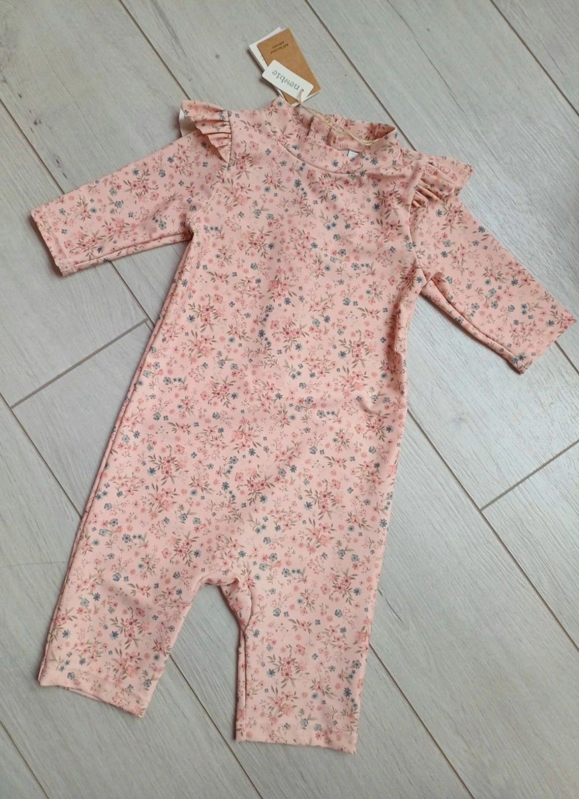 Kombinezon kostium kąpielowy UV Newbie r. 86/92 strój w kwiaty róże