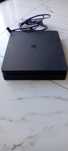 PS4 Slim 500GB + 2 pady + 3 gry