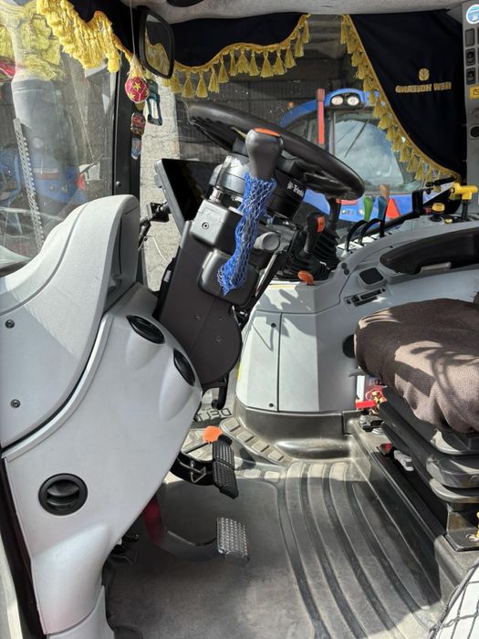 Траткор new holland t6020 124 л.с