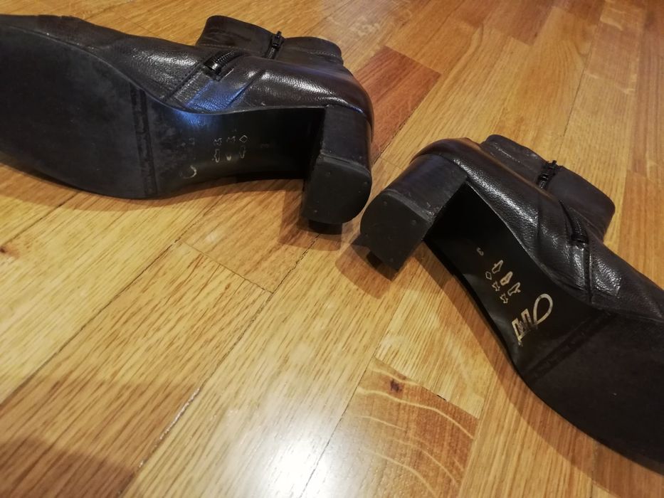 Botas em pele castanhas