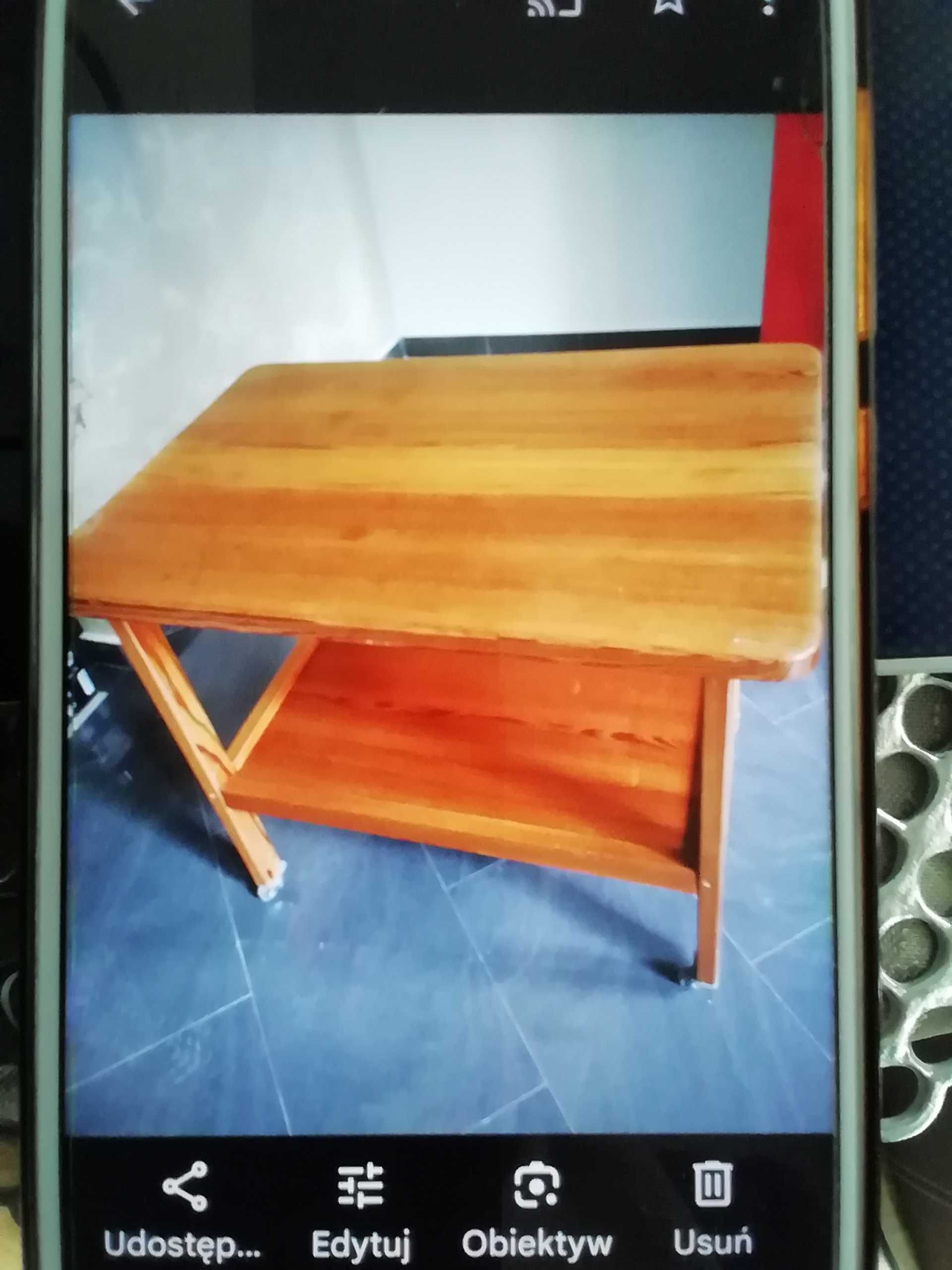 Sprzedam używany stolik z półką/ na kółkach/ z litego drewna ,