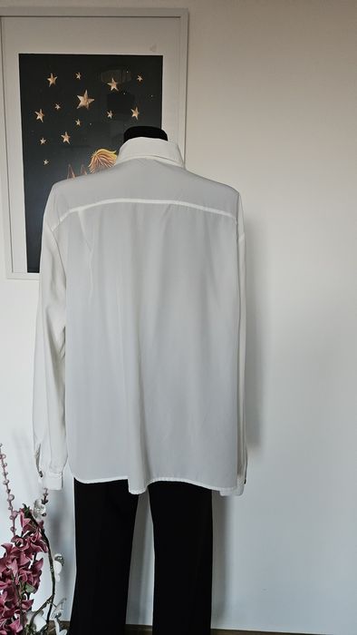 Biała bluzka koszulowa z cudnym haftem rozmiar XXL
Śliczna biala bluzk