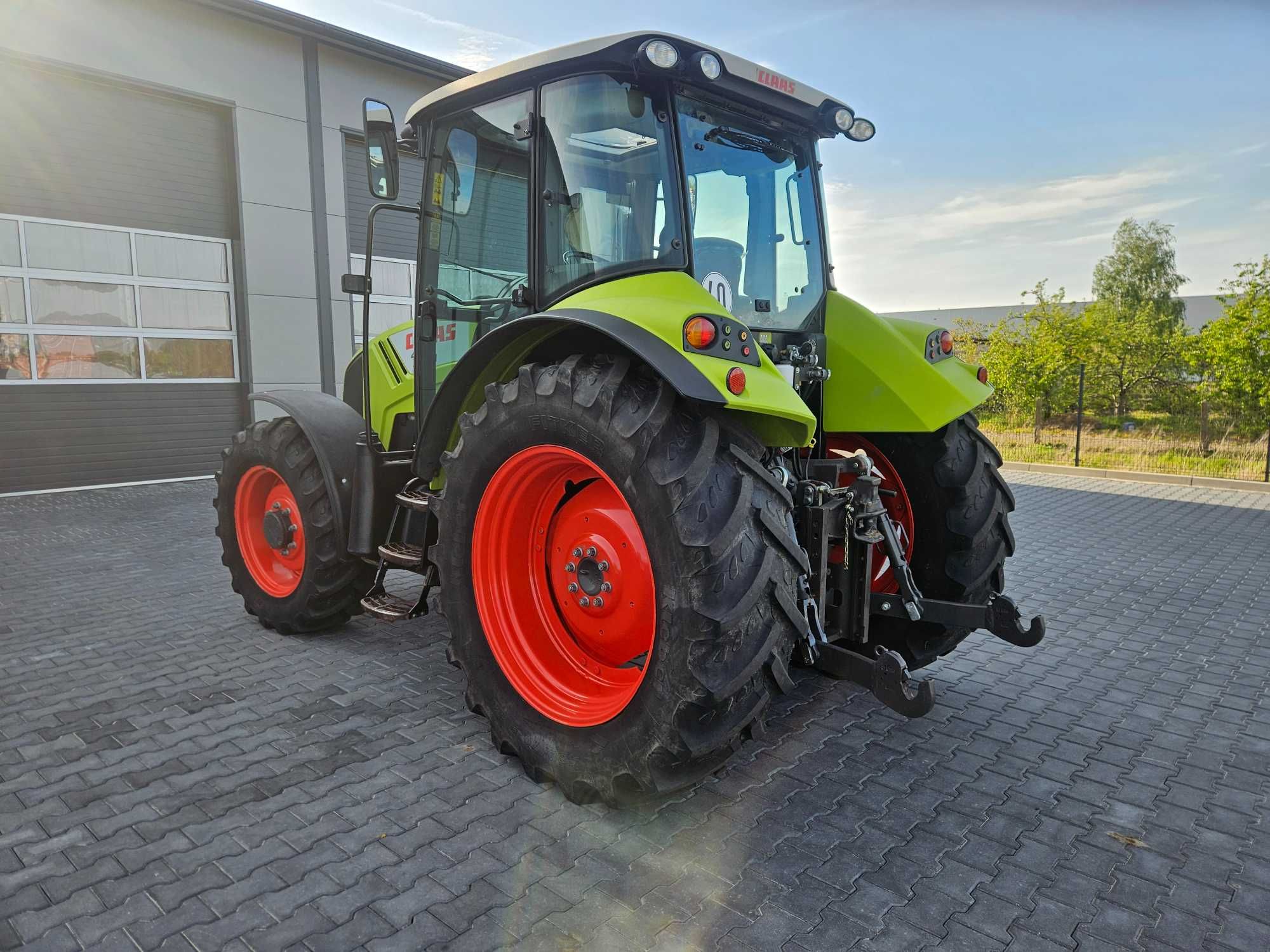 Claas Arion 410 Axos