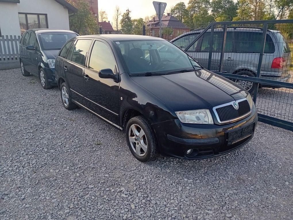 Opel Meriva 1,4 B  Fabia 1,2