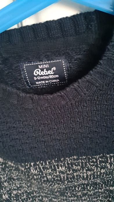Nowy sweterek chłopięcy Rebel r. 80