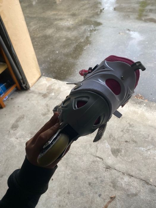 Patins em linha rosa e choc vi