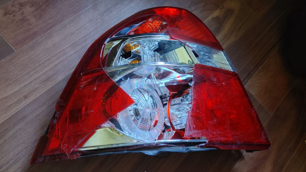 Задня фара стоп лівий Авео т-250