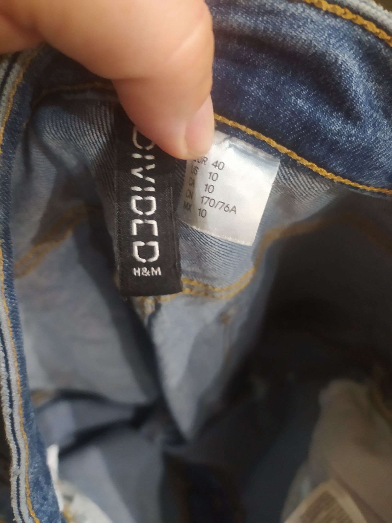 Spodnie elastyczne jeansy dżinsy bawełniane z rozdarciami r 40 L H&M