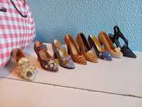 Tudo 10€ Conjunto de 8 miniaturas de sapatos vintage.
Novos, nunca usa