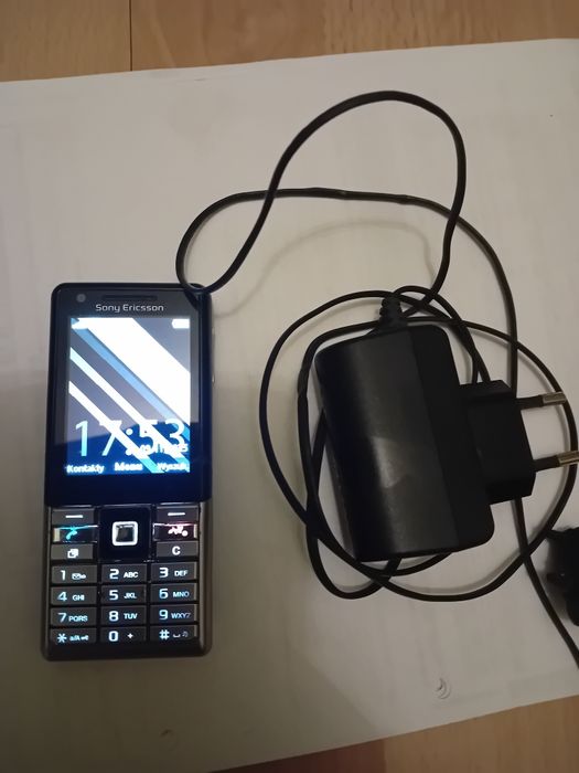 Sony Ericsson J105i ,ładowarki, słuchawki ,konwerter