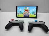 2 Suportes para Comandos Nintendo Switch Joy-Con