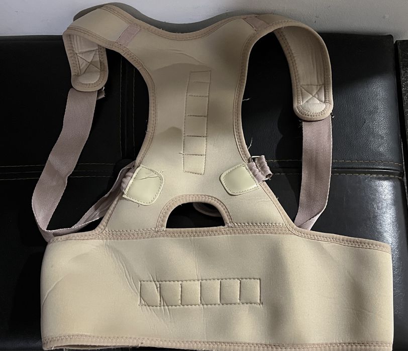 Colete corretor de portura