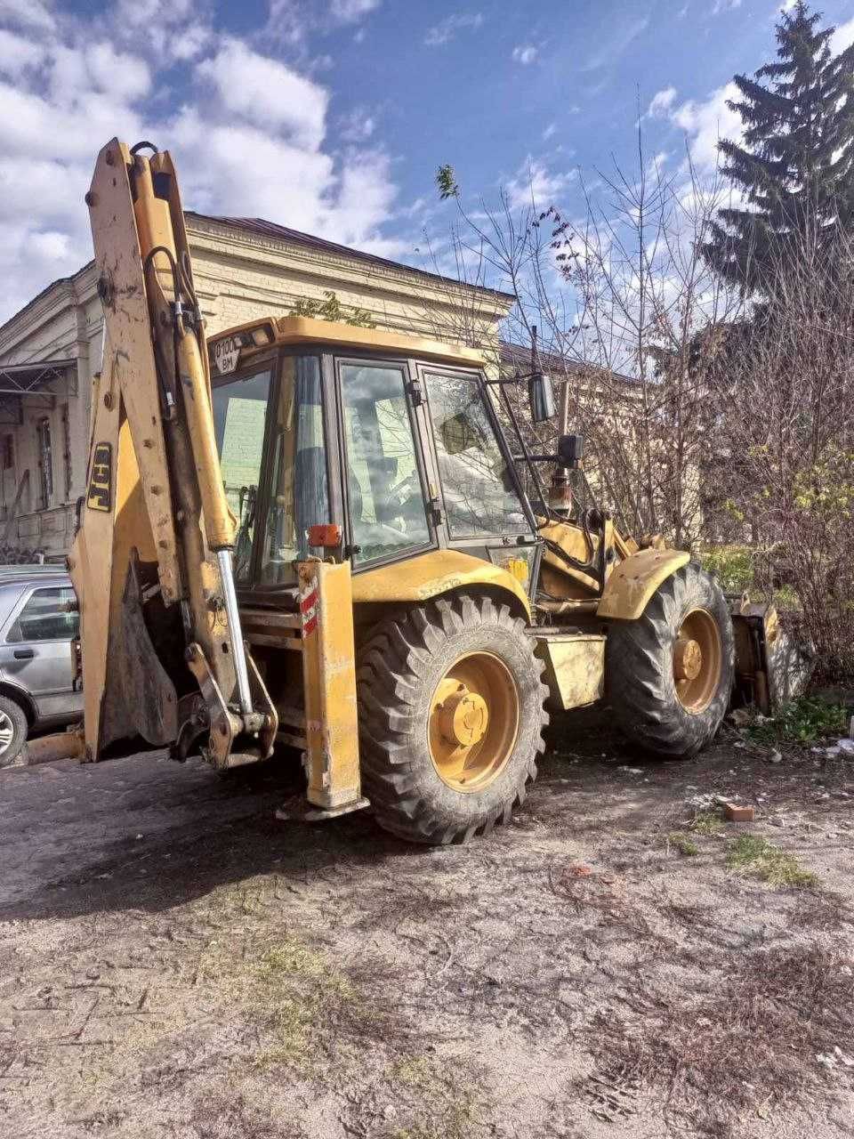 Экскаватор  погрузчик JCB 4