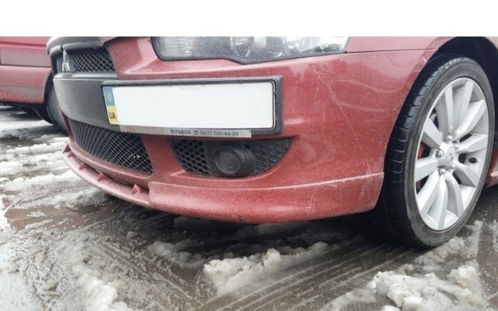 Накладки на  передний бампер Mitsubishi Lancer X 10 углы перемычка м