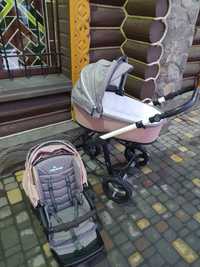 Универсальная всесезонная коляска фирмы Baby Design Husky 2 в 1