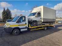 Holowanie laweta pomoc drogowa auto pomoc transport samochodowy tanie