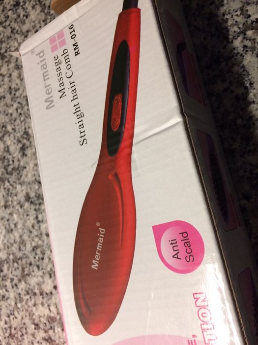 Escova de cabelo elétrica