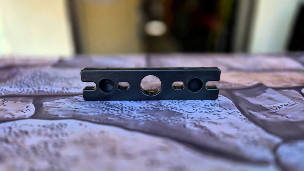 Mocowanie do prowadnic stosu na pręty fi 20mm