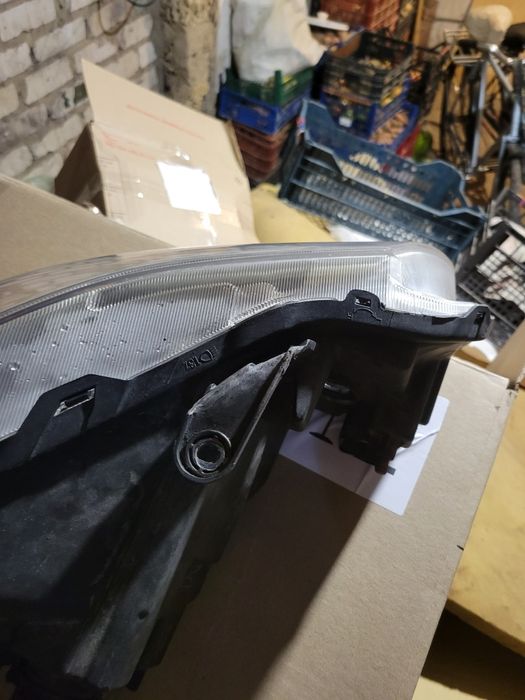 Фара Suziki SX4 2008 ліва оригінал