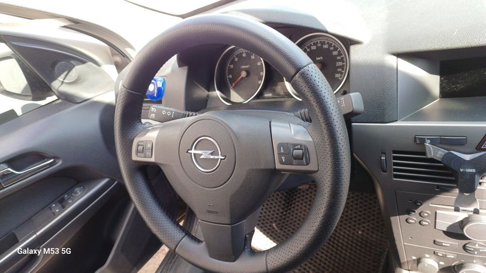 Карты обшивка ручка замок опель астра  OPEL ASTRA H