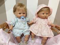Casal de gemeos com cesta