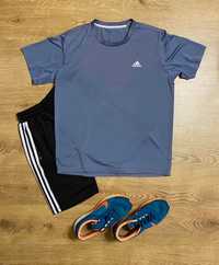 Szara, męska, sportowa koszulka marki Adidas rozmiar M