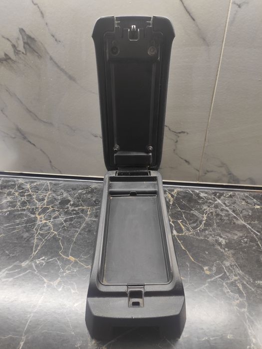 Підлокітник для машини