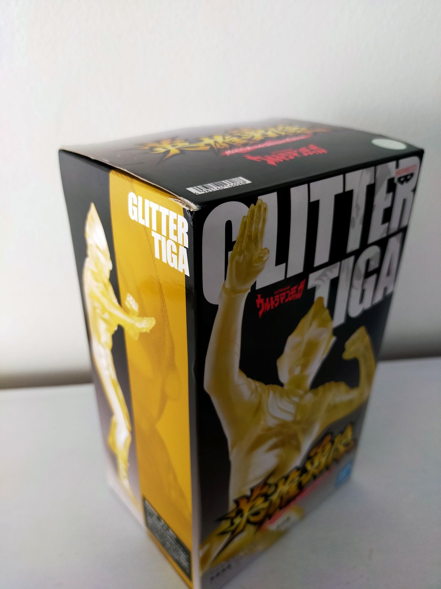Figura Glitter Tiga Gold Nova Embalada
